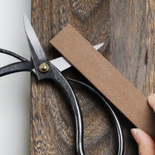 Load image into Gallery viewer, #240 Medium Grit Whestone sharepning a bonsai scissors blade