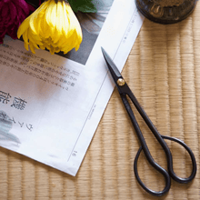 Load image into Gallery viewer, Satsuki layed on a tatami