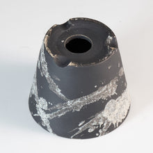 Load image into Gallery viewer, Black ceramic pot with a central drainage hole on a white background
