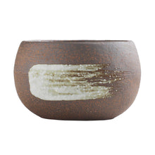 Load image into Gallery viewer, Close up on the white brush strike on the front of the pot 

